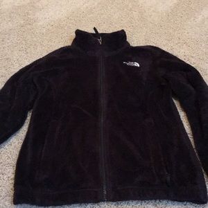 A fuzzy black North Face.